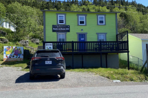 Picture of Bistro exterior showing parking space.