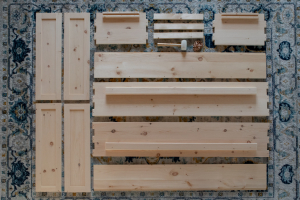 Pine casket kit components laid out